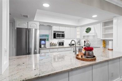 TASTEFULLY REMODELED AND UPDATED first floor condo with double on Pecan Plantation Country Club in Texas - for sale on GolfHomes.com, golf home, golf lot