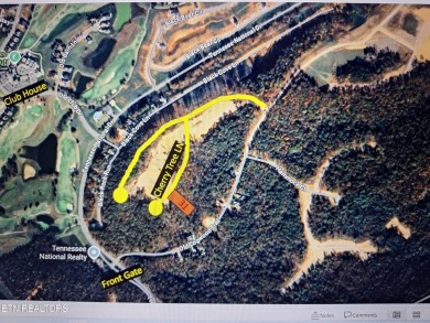 Build your dream home on this beautiful .96 acre wooded lot on Tennessee National Golf Club in Tennessee - for sale on GolfHomes.com, golf home, golf lot