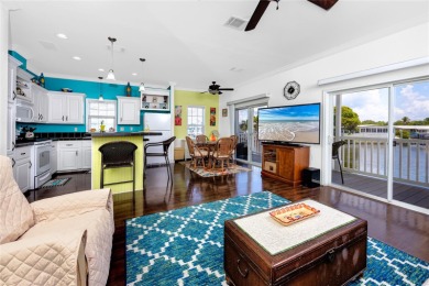 Experience the best of Florida living in this beautifully on Mangrove Bay Golf Course in Florida - for sale on GolfHomes.com, golf home, golf lot