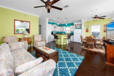 Experience the best of Florida living in this beautifully on Mangrove Bay Golf Course in Florida - for sale on GolfHomes.com, golf home, golf lot