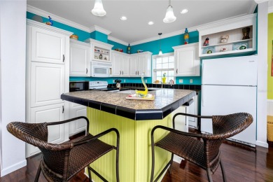Experience the best of Florida living in this beautifully on Mangrove Bay Golf Course in Florida - for sale on GolfHomes.com, golf home, golf lot