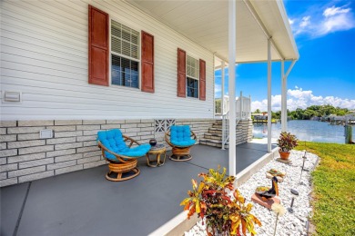 Experience the best of Florida living in this beautifully on Mangrove Bay Golf Course in Florida - for sale on GolfHomes.com, golf home, golf lot