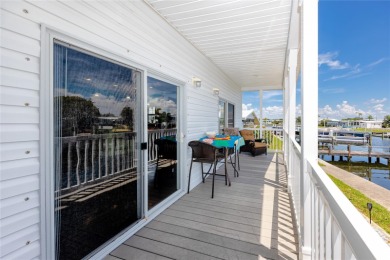 Experience the best of Florida living in this beautifully on Mangrove Bay Golf Course in Florida - for sale on GolfHomes.com, golf home, golf lot