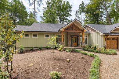 Discover the epitome of modern mountain living with this brand on Sapphire National Golf Club in North Carolina - for sale on GolfHomes.com, golf home, golf lot