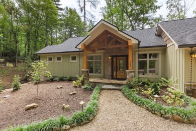 Discover the epitome of modern mountain living with this brand on Sapphire National Golf Club in North Carolina - for sale on GolfHomes.com, golf home, golf lot