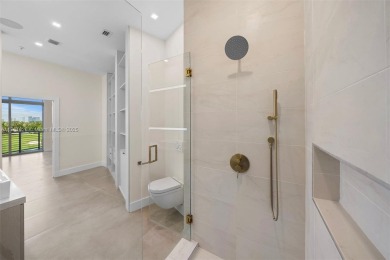 Live in one of the most serene areas of South Beach, directly on Miami Beach Golf Club in Florida - for sale on GolfHomes.com, golf home, golf lot