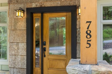 Discover the epitome of modern mountain living with this brand on Sapphire National Golf Club in North Carolina - for sale on GolfHomes.com, golf home, golf lot