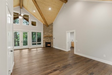 Discover the epitome of modern mountain living with this brand on Sapphire National Golf Club in North Carolina - for sale on GolfHomes.com, golf home, golf lot