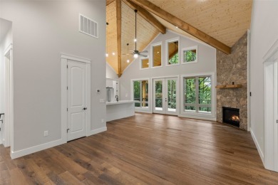 Discover the epitome of modern mountain living with this brand on Sapphire National Golf Club in North Carolina - for sale on GolfHomes.com, golf home, golf lot