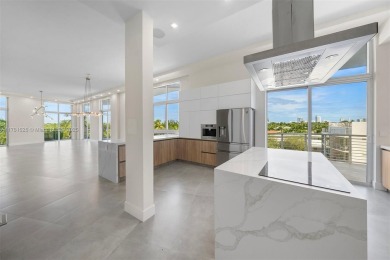 Live in one of the most serene areas of South Beach, directly on Miami Beach Golf Club in Florida - for sale on GolfHomes.com, golf home, golf lot