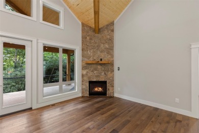 Discover the epitome of modern mountain living with this brand on Sapphire National Golf Club in North Carolina - for sale on GolfHomes.com, golf home, golf lot