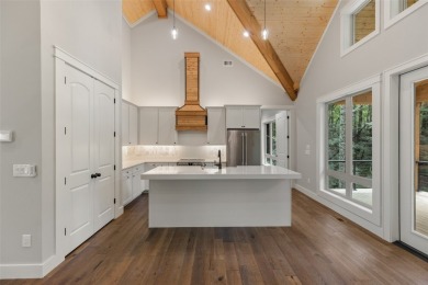 Discover the epitome of modern mountain living with this brand on Sapphire National Golf Club in North Carolina - for sale on GolfHomes.com, golf home, golf lot
