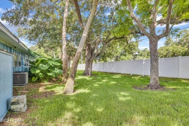 Welcome Home to this quiet and comfortable half duplex in the on New Smyrna Beach Golf Course in Florida - for sale on GolfHomes.com, golf home, golf lot