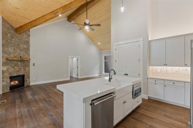 Discover the epitome of modern mountain living with this brand on Sapphire National Golf Club in North Carolina - for sale on GolfHomes.com, golf home, golf lot