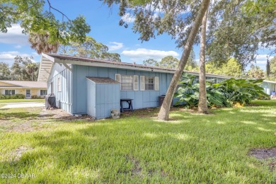 Welcome Home to this quiet and comfortable half duplex in the on New Smyrna Beach Golf Course in Florida - for sale on GolfHomes.com, golf home, golf lot