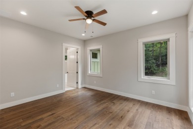 Discover the epitome of modern mountain living with this brand on Sapphire National Golf Club in North Carolina - for sale on GolfHomes.com, golf home, golf lot
