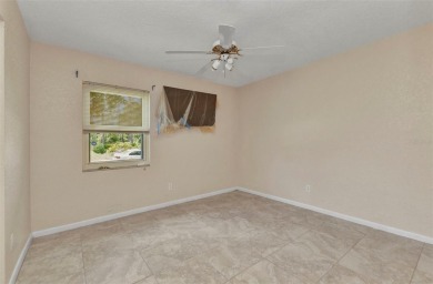 NO HOA - FENCED YARD - MINUTES TO CHARLOTTE HARBOR! This on Port Charlotte Golf Club in Florida - for sale on GolfHomes.com, golf home, golf lot