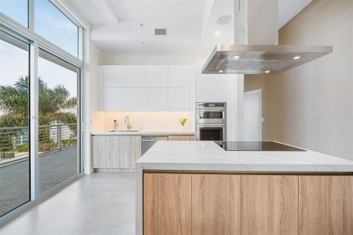 Live in one of the most serene areas of South Beach, directly on Miami Beach Golf Club in Florida - for sale on GolfHomes.com, golf home, golf lot