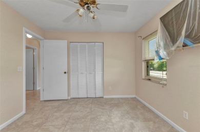 NO HOA - FENCED YARD - MINUTES TO CHARLOTTE HARBOR! This on Port Charlotte Golf Club in Florida - for sale on GolfHomes.com, golf home, golf lot