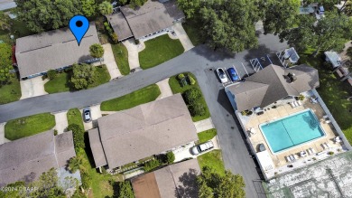 Welcome Home to this quiet and comfortable half duplex in the on New Smyrna Beach Golf Course in Florida - for sale on GolfHomes.com, golf home, golf lot