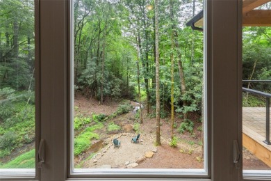 Discover the epitome of modern mountain living with this brand on Sapphire National Golf Club in North Carolina - for sale on GolfHomes.com, golf home, golf lot