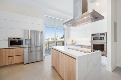 Live in one of the most serene areas of South Beach, directly on Miami Beach Golf Club in Florida - for sale on GolfHomes.com, golf home, golf lot