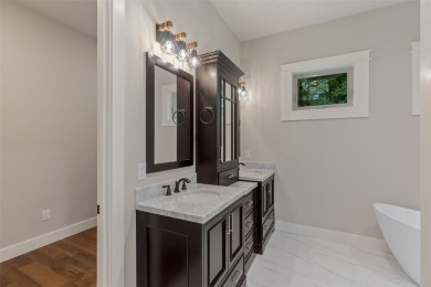 Discover the epitome of modern mountain living with this brand on Sapphire National Golf Club in North Carolina - for sale on GolfHomes.com, golf home, golf lot