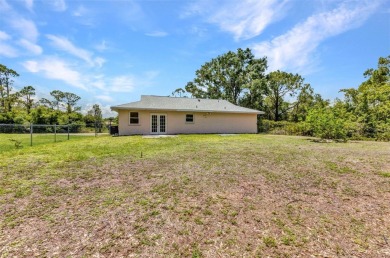 NO HOA - FENCED YARD - MINUTES TO CHARLOTTE HARBOR! This on Port Charlotte Golf Club in Florida - for sale on GolfHomes.com, golf home, golf lot