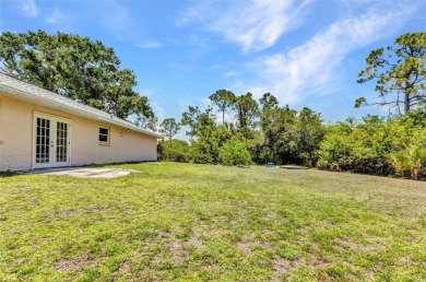 NO HOA - FENCED YARD - MINUTES TO CHARLOTTE HARBOR! This on Port Charlotte Golf Club in Florida - for sale on GolfHomes.com, golf home, golf lot