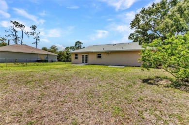 NO HOA - FENCED YARD - MINUTES TO CHARLOTTE HARBOR! This on Port Charlotte Golf Club in Florida - for sale on GolfHomes.com, golf home, golf lot