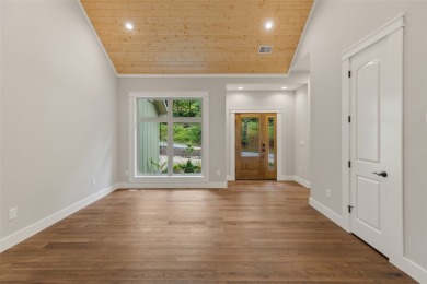 Discover the epitome of modern mountain living with this brand on Sapphire National Golf Club in North Carolina - for sale on GolfHomes.com, golf home, golf lot