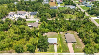 NO HOA - FENCED YARD - MINUTES TO CHARLOTTE HARBOR! This on Port Charlotte Golf Club in Florida - for sale on GolfHomes.com, golf home, golf lot