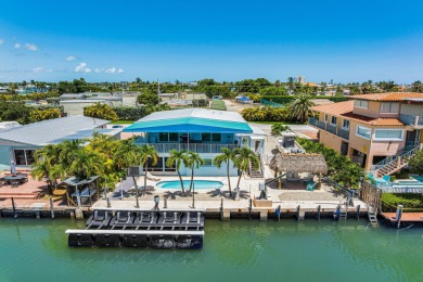 Embrace the laid back charm of the Florida Keys with this on Key Colony Beach Golf Course in Florida - for sale on GolfHomes.com, golf home, golf lot