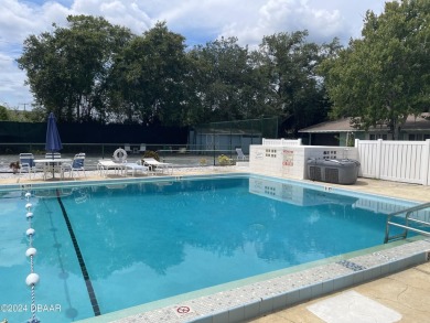 Welcome Home to this quiet and comfortable half duplex in the on New Smyrna Beach Golf Course in Florida - for sale on GolfHomes.com, golf home, golf lot