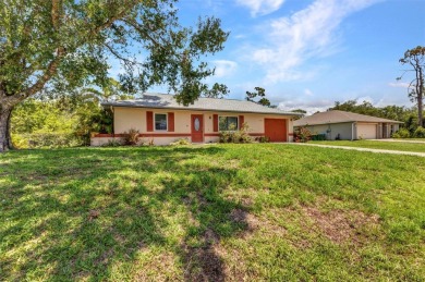 NO HOA - FENCED YARD - MINUTES TO CHARLOTTE HARBOR! This on Port Charlotte Golf Club in Florida - for sale on GolfHomes.com, golf home, golf lot