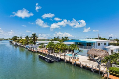 Embrace the laid back charm of the Florida Keys with this on Key Colony Beach Golf Course in Florida - for sale on GolfHomes.com, golf home, golf lot