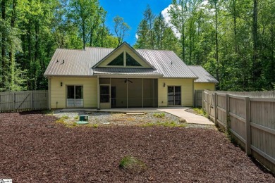 Tucked beside a quiet creek and backing up to The Rock Golf Club on The Rock At Jocassee in South Carolina - for sale on GolfHomes.com, golf home, golf lot
