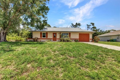 NO HOA - FENCED YARD - MINUTES TO CHARLOTTE HARBOR! This on Port Charlotte Golf Club in Florida - for sale on GolfHomes.com, golf home, golf lot