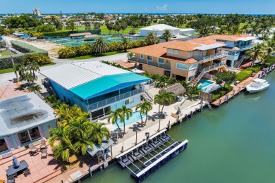 Embrace the laid back charm of the Florida Keys with this on Key Colony Beach Golf Course in Florida - for sale on GolfHomes.com, golf home, golf lot