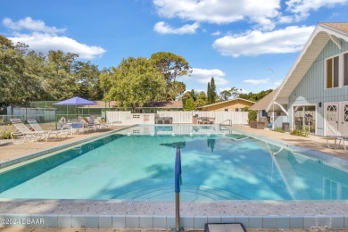 Welcome Home to this quiet and comfortable half duplex in the on New Smyrna Beach Golf Course in Florida - for sale on GolfHomes.com, golf home, golf lot