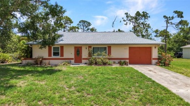 NO HOA - FENCED YARD - MINUTES TO CHARLOTTE HARBOR! This on Port Charlotte Golf Club in Florida - for sale on GolfHomes.com, golf home, golf lot