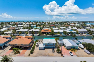 Embrace the laid back charm of the Florida Keys with this on Key Colony Beach Golf Course in Florida - for sale on GolfHomes.com, golf home, golf lot