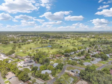 Welcome Home to this quiet and comfortable half duplex in the on New Smyrna Beach Golf Course in Florida - for sale on GolfHomes.com, golf home, golf lot