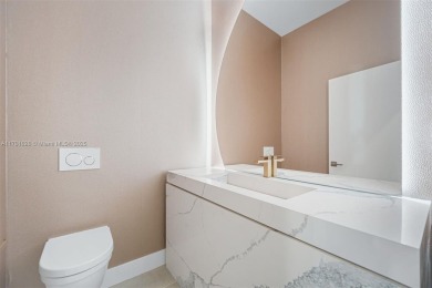 Live in one of the most serene areas of South Beach, directly on Miami Beach Golf Club in Florida - for sale on GolfHomes.com, golf home, golf lot
