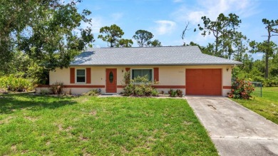 NO HOA - FENCED YARD - MINUTES TO CHARLOTTE HARBOR! This on Port Charlotte Golf Club in Florida - for sale on GolfHomes.com, golf home, golf lot