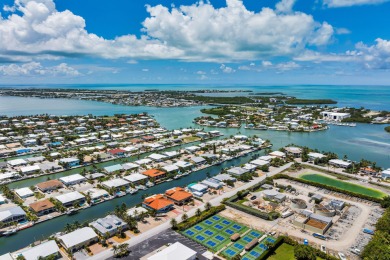 Embrace the laid back charm of the Florida Keys with this on Key Colony Beach Golf Course in Florida - for sale on GolfHomes.com, golf home, golf lot
