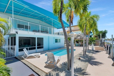 Embrace the laid back charm of the Florida Keys with this on Key Colony Beach Golf Course in Florida - for sale on GolfHomes.com, golf home, golf lot