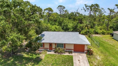 NO HOA - FENCED YARD - MINUTES TO CHARLOTTE HARBOR! This on Port Charlotte Golf Club in Florida - for sale on GolfHomes.com, golf home, golf lot