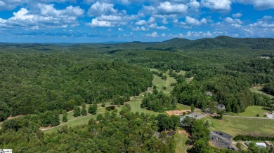 Tucked beside a quiet creek and backing up to The Rock Golf Club on The Rock At Jocassee in South Carolina - for sale on GolfHomes.com, golf home, golf lot