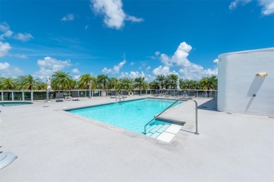 Live in one of the most serene areas of South Beach, directly on Miami Beach Golf Club in Florida - for sale on GolfHomes.com, golf home, golf lot